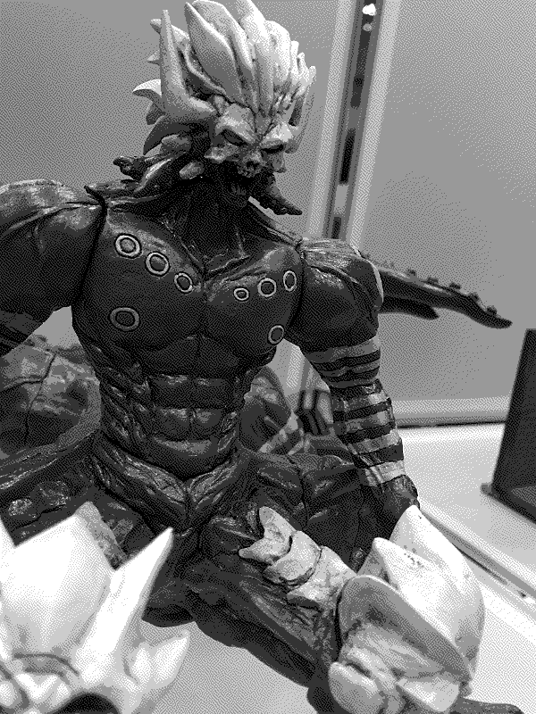 A closeup photo of Hybrid Enemy's Azel figure.