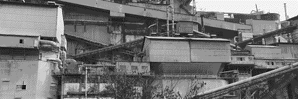 A photo of rusted industrial buildings